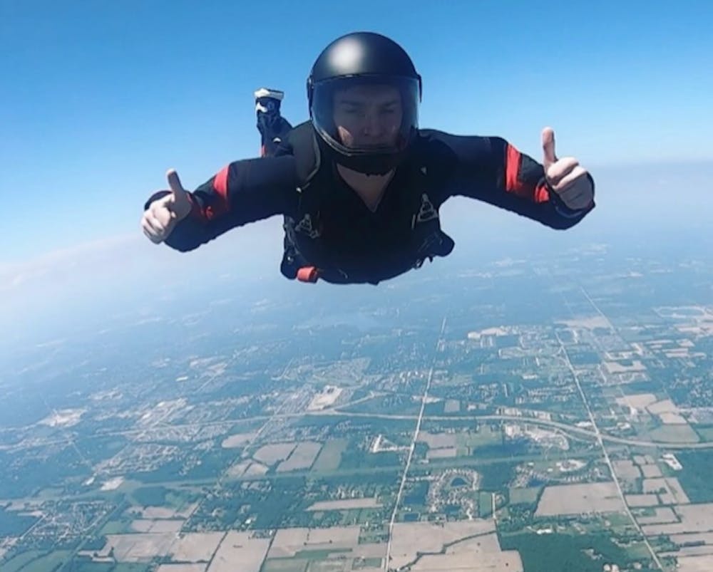 <p>Skydiving club member Noah Roux skydiving. Photo courtesy of Noah Roux </p>