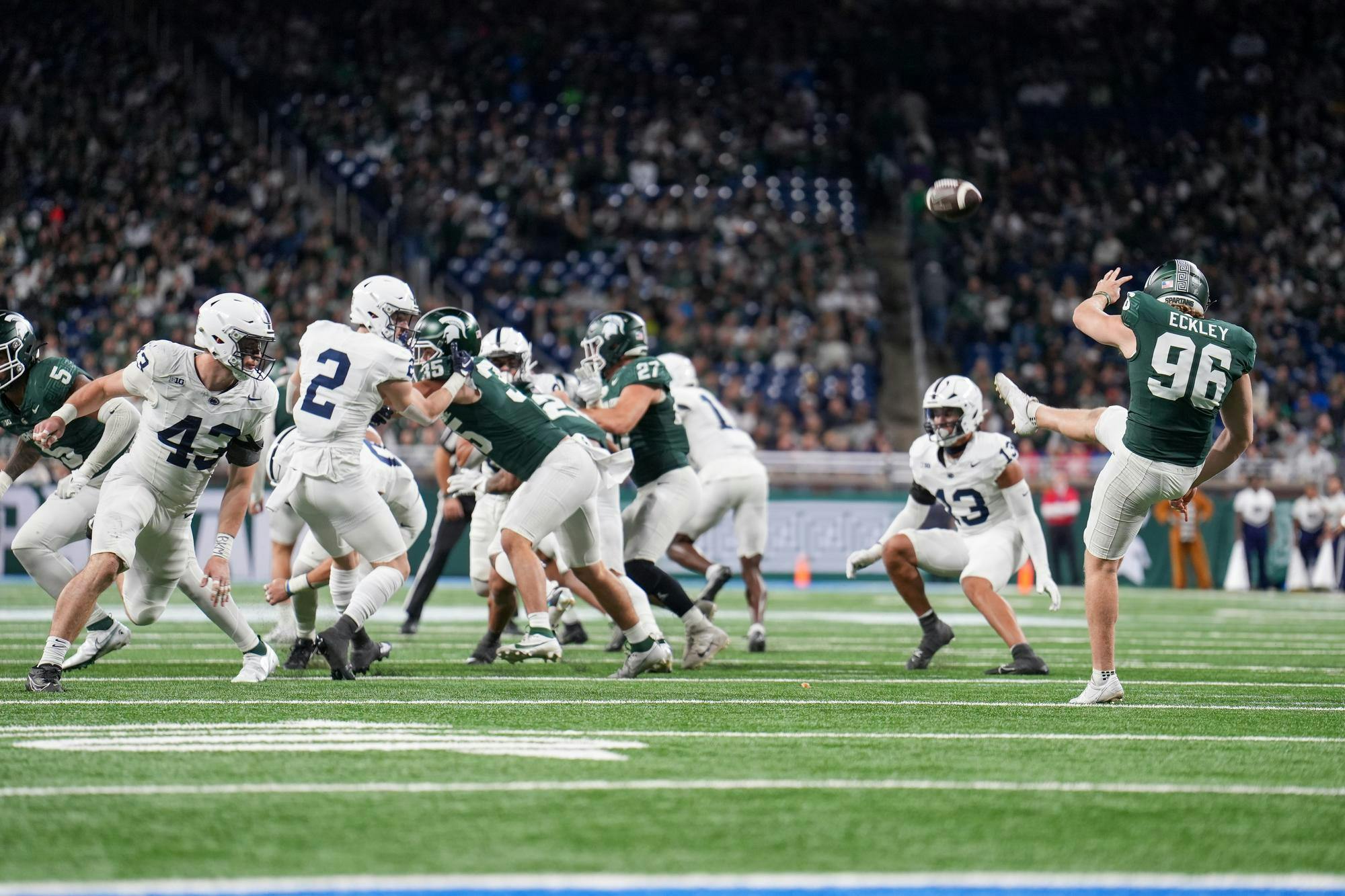 <p>Redshirt freshman penalty kicker Ryan Eckley (96) punting the ball during a game against Penn State at Ford Field on Nov. 24, 2023.</p>