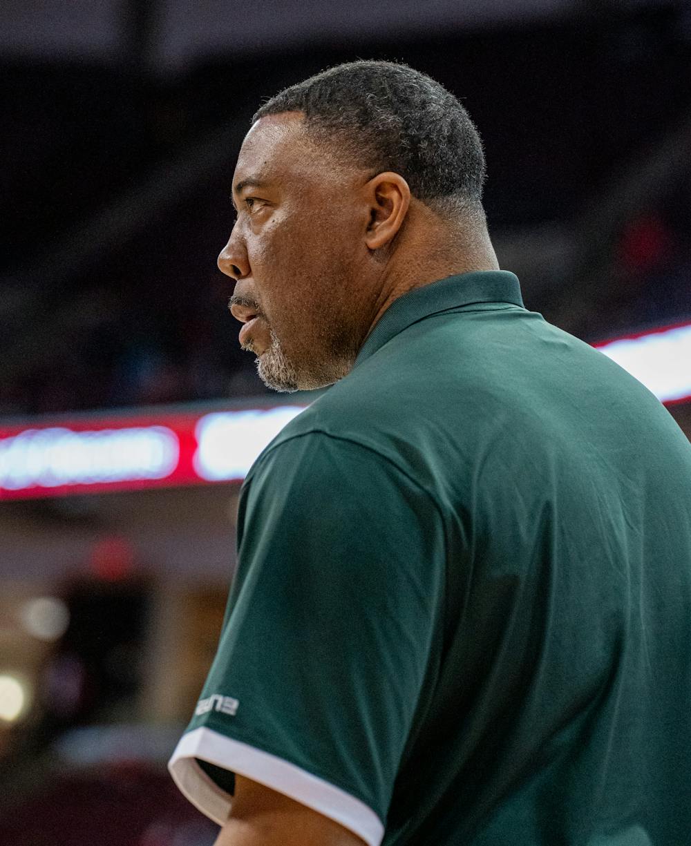 <p>Michigan State associate head coach Dwayne Stephens watches as the Spartans prepare for the Buckeyes on Mar. 3, 2022.</p>