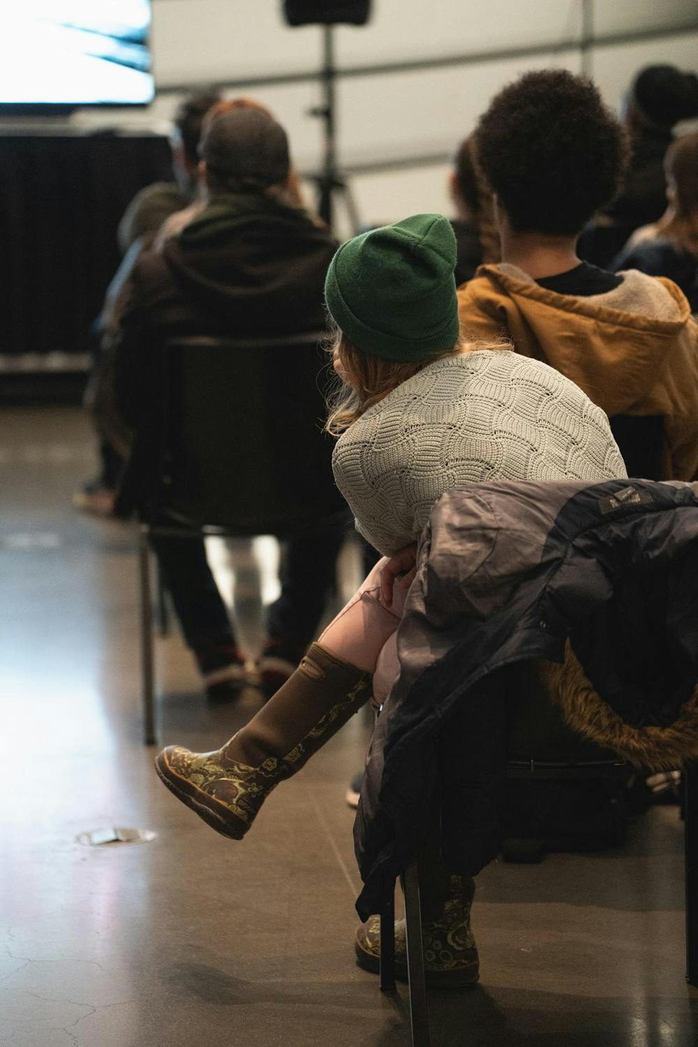An attendee watching the feature documentary film during the 2026 MSU Latinx Film Festival at the Broad Art Museum in East Lansing, on Feb. 20th, 2026.