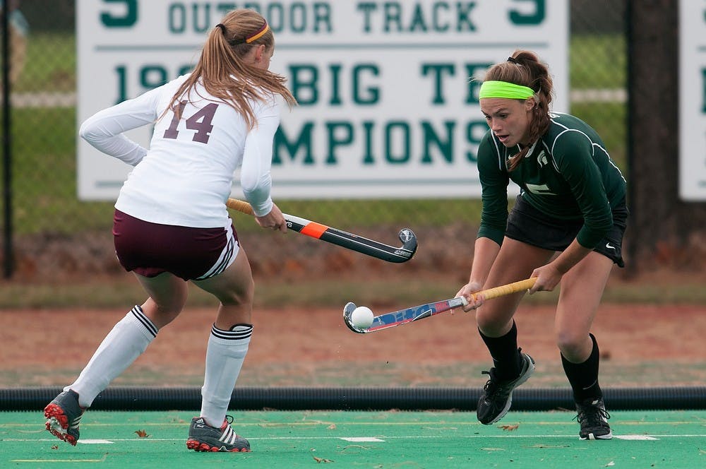 	<p>Junior forward Abby Barker and Central Michigan back Anne Middeldorp fight for possession of the ball Oct. 22, 2013, at Ralph Young Field. The Spartans won, 1-0. Julia Nagy/The State News</p>