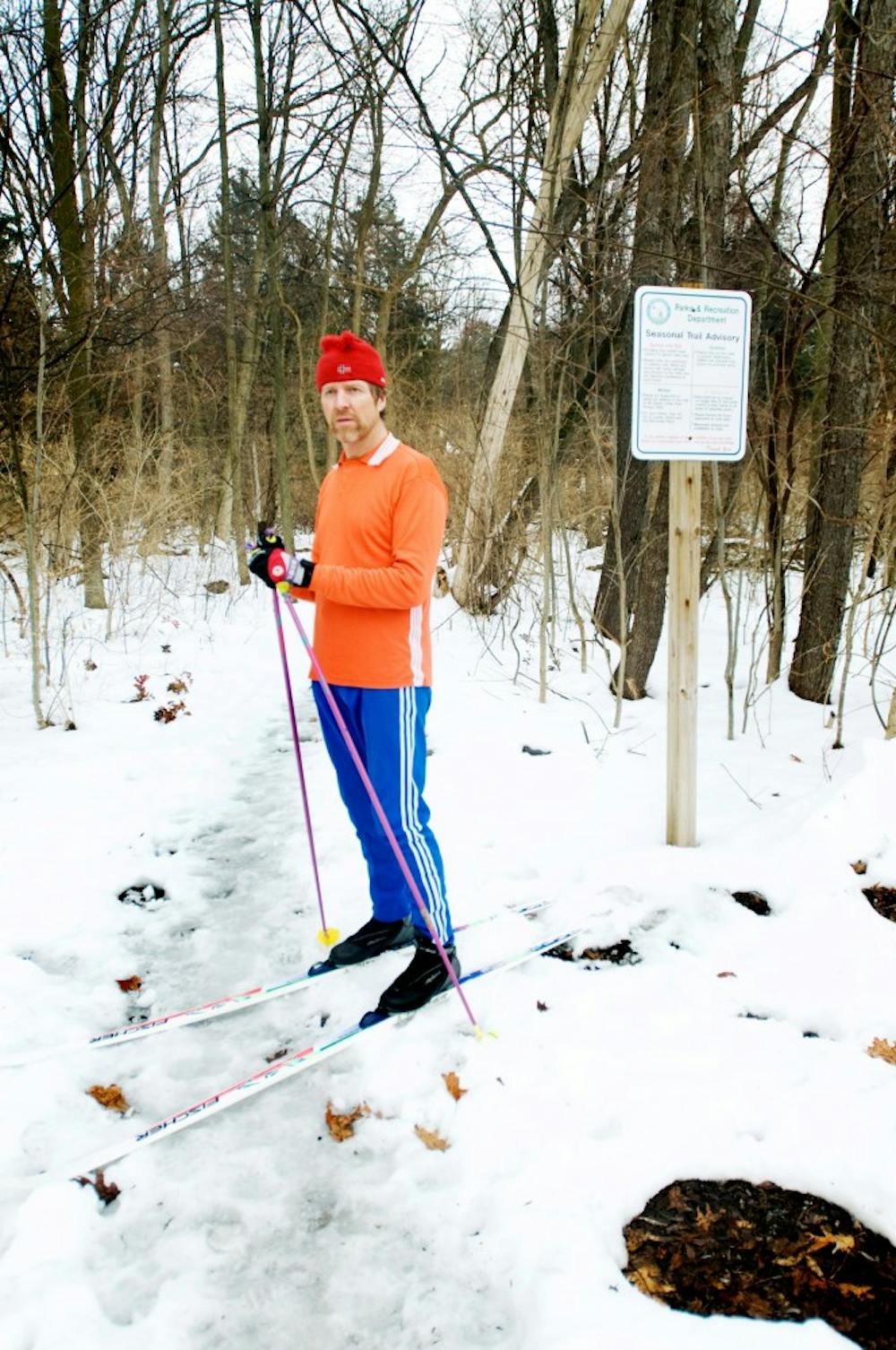 	<p>Jeff Potter stands at the beginning of the Ted Black Woods Park in Okemos where he spends a lot of time cross-country skiing. Nearly 20 years ago, Potter’s love of journalism and the outdoors led him to begin his own independent outdoor culture company called Out Your Backdoor. He sells gear and hard-to-find books, as well as gathers articles about the outdoors.</p>