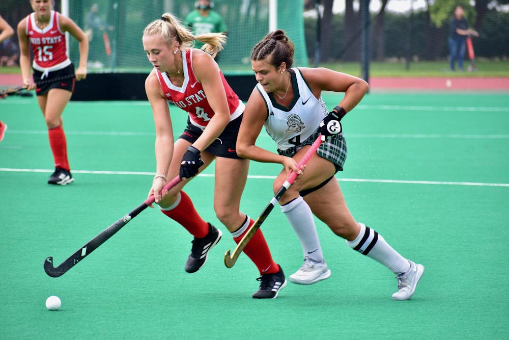 <p>Michigan State women's field hockey fifth-year midfielder Celina Riccardo, #4, goes after the ball at a game against Ohio State at Ralph Young Field on Sept. 17, 2023. The Spartans lost 2-1 in overtime.</p>