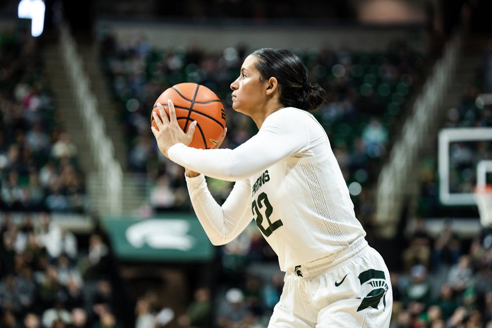 <p>Senior guard Moira Joiner (22) shoots for three. MSU went on to win against Penn State 81-75 in overtime on Feb. 12, 2023.</p>