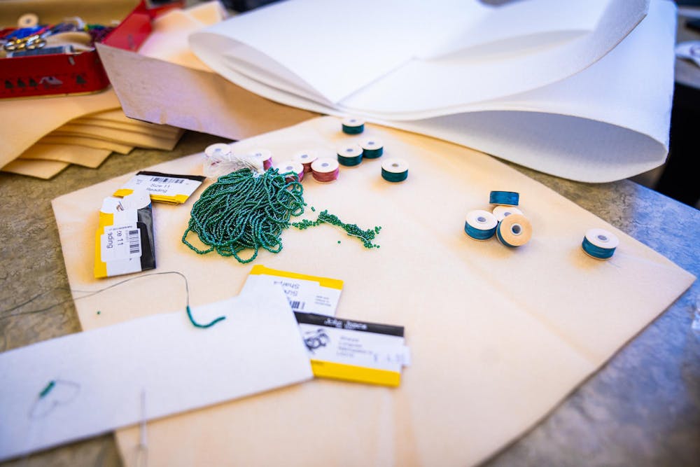 Small rolls of yarn and beads are taken out during a beading workshop held at the Urban Planning and Landscape Architecture building on Nov. 19, 2024.