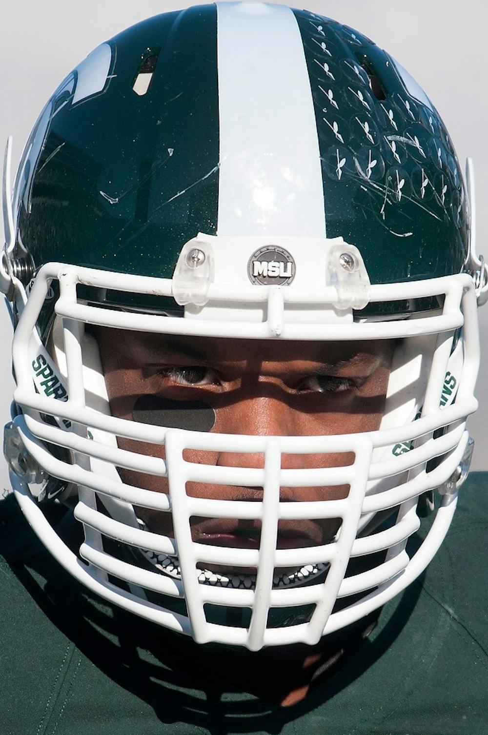 	<p>Sophomore defensive end Shilique Calhoun looks at the field on Nov. 30, 2013, before the game against Minnesota at Spartan Stadium. The Spartans defeated the Golden Gophers, 14-3. Julia Nagy/The State News</p>