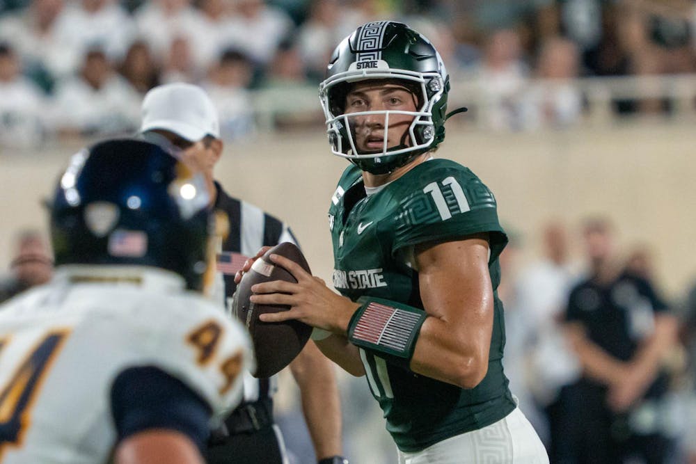 <p>Alessio Milivojevic (11) runs with the ball during the Michigan State vs. Toledo football game at Spartan Stadium in East Lansing, Mich., on Friday, Sept. 4, 2026.</p>