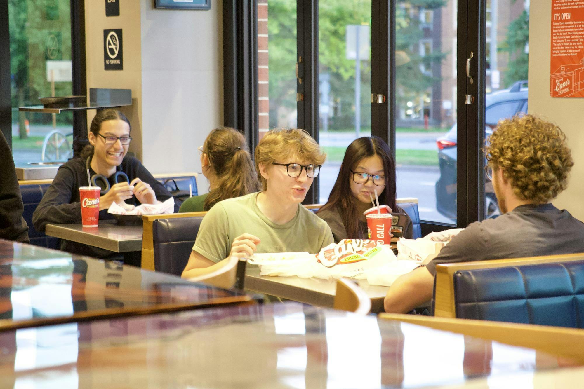 <p>Michigan State University students eat dinner in booths at Raising Cane’s in East Lansing, Mich., on Tuesday, Sept. 23, 2026.</p>