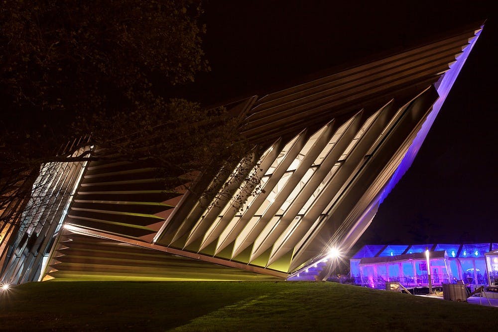 	<p>The Eli and Edythe Broad Art Museum is illuminated by lights from a private party on Friday, Nov. 9, 2012. The museum was opened to the public on Sunday, Nov. 11, 2012. Julia Nagy/The State News</p>