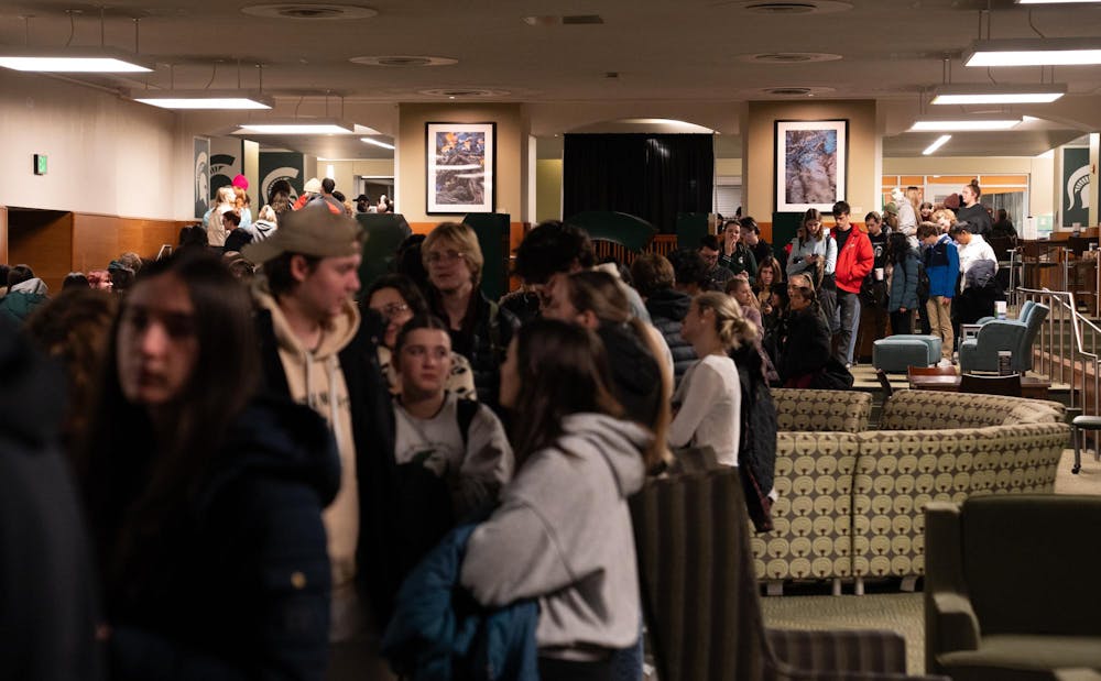 <p>Over 300 students wait in line to get free shirts and rubber ducks at the student union during the Alcohol and Other Drugs Program's Farewell to the Flock event on Dec. 2, 2024.</p>