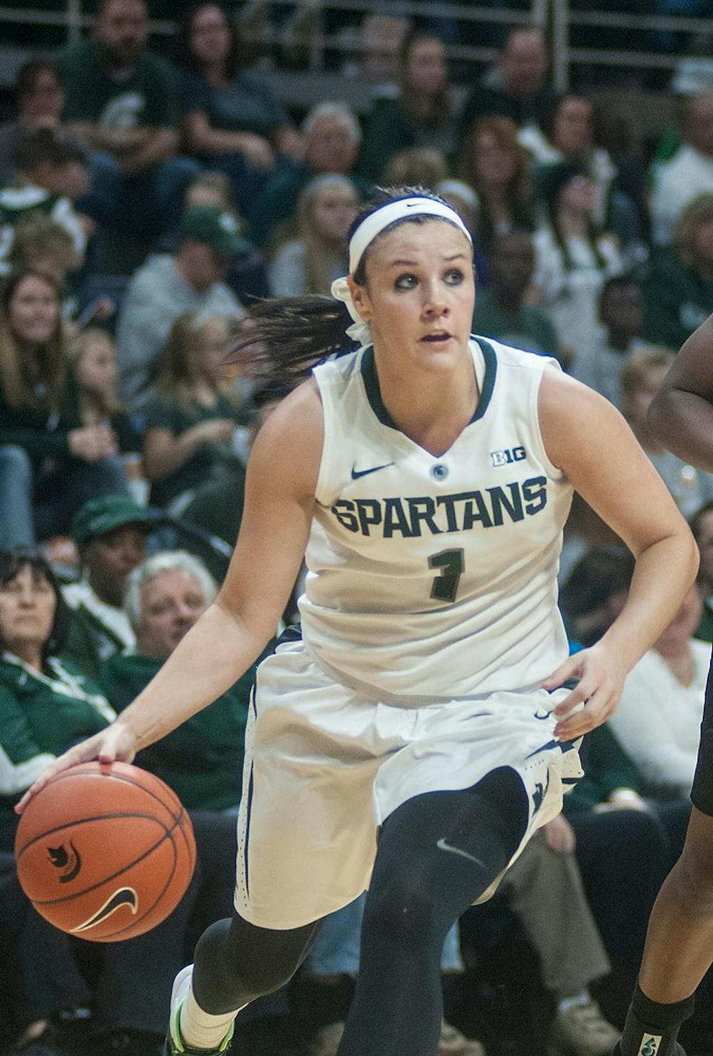 <p>Sophomore guard Tori Jankoska dribbles the ball down court Nov. 23, 2014, during the game against IUPUI at Breslin Center. The Spartans defeated the Jaguars, 64-45. Jessalyn Tamez/The State News </p>