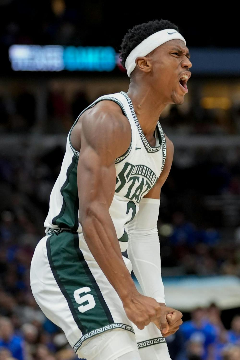 <p>Graduate student guard Tyson Walker (2) cheers after scoring a three pointer during the Champions Classic at the United Center on Nov. 14, 2023. The Spartans fell to the Blue Devils with a score of 74-65.</p>