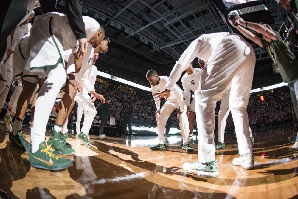 The Spartans huddle before the men's basketball game against the University of Michigan on Jan. 29, 2017 at Breslin Center. The Spartans defeated the Wolverines, 70-62.