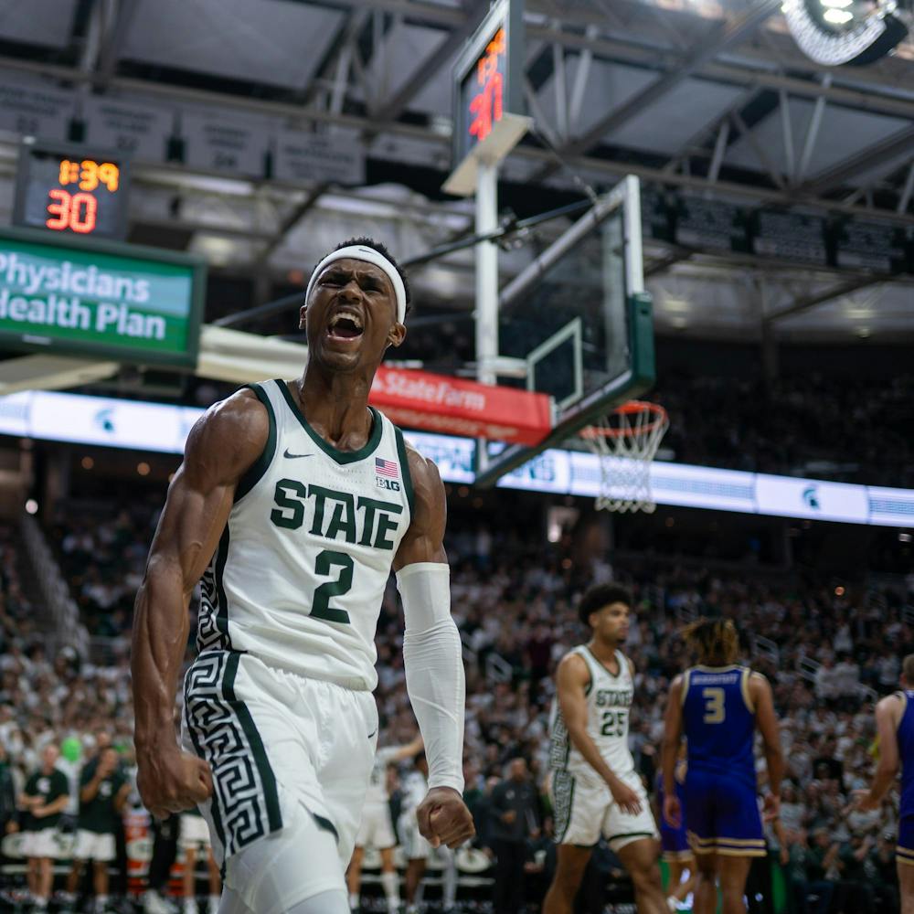 <p>Graduate student guard Tyson Walker (2) celebrating a made layup during a game against James Madison University at the Breslin Student Events Center on Nov. 6, 2023.</p>