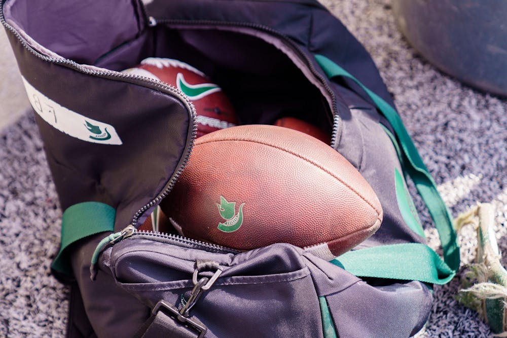 A bag full of footballs rests on the sideline during the MSU football spring open practice, held at Spartan Stadium on April 15, 2023.