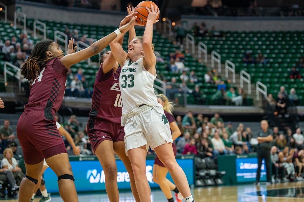 <p>MSU freshman forward Juliann Woodward (33) shoots a layup against Eastern Kentucky at the Breslin Center on Nov. 14, 2024.</p>