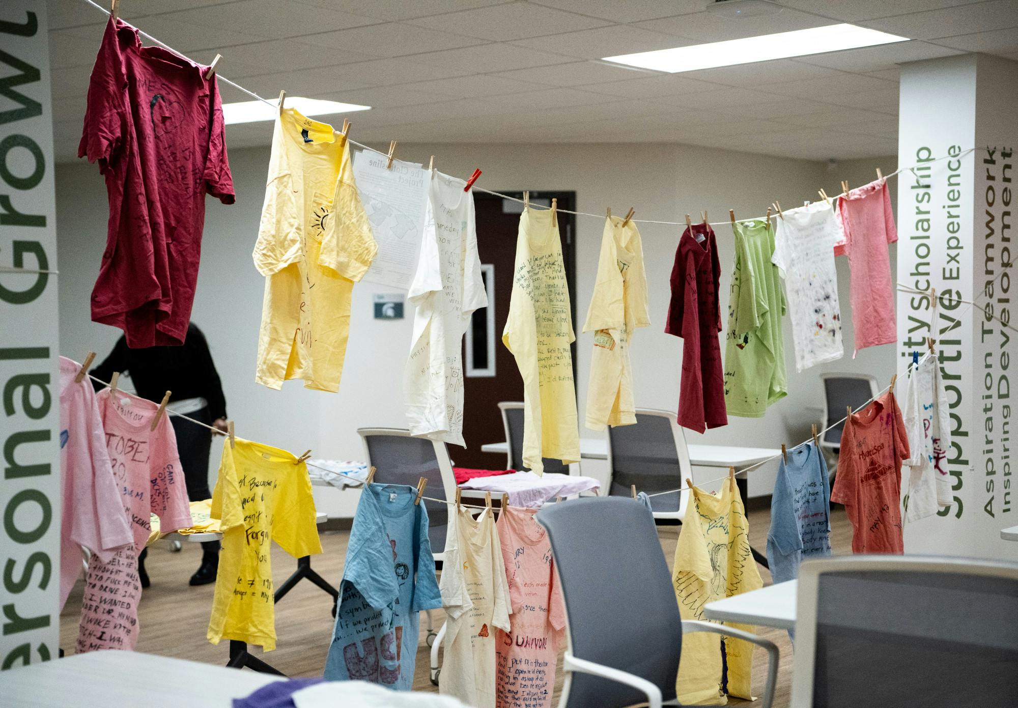 <p><strong>In honor of Sexual Assault Awareness month, the Clothesline Project presents a unique way to spread awareness. As stated in their mission description: &quot;The Clothesline Project celebrates the strength and courage of women who have survived acts of violence and provides a testimonial to those who did not survive&quot;. This project, which is nationally widespread, helps to give the women &quot;a new voice with which to expose an often horrific and unspeakable experience that has dramatically altered the course of her life&quot;. Through the making of the t-shirts, women are taking a stand against their previous silence that has been a part of her experience. </strong></p><p><br/><br/><br/></p>