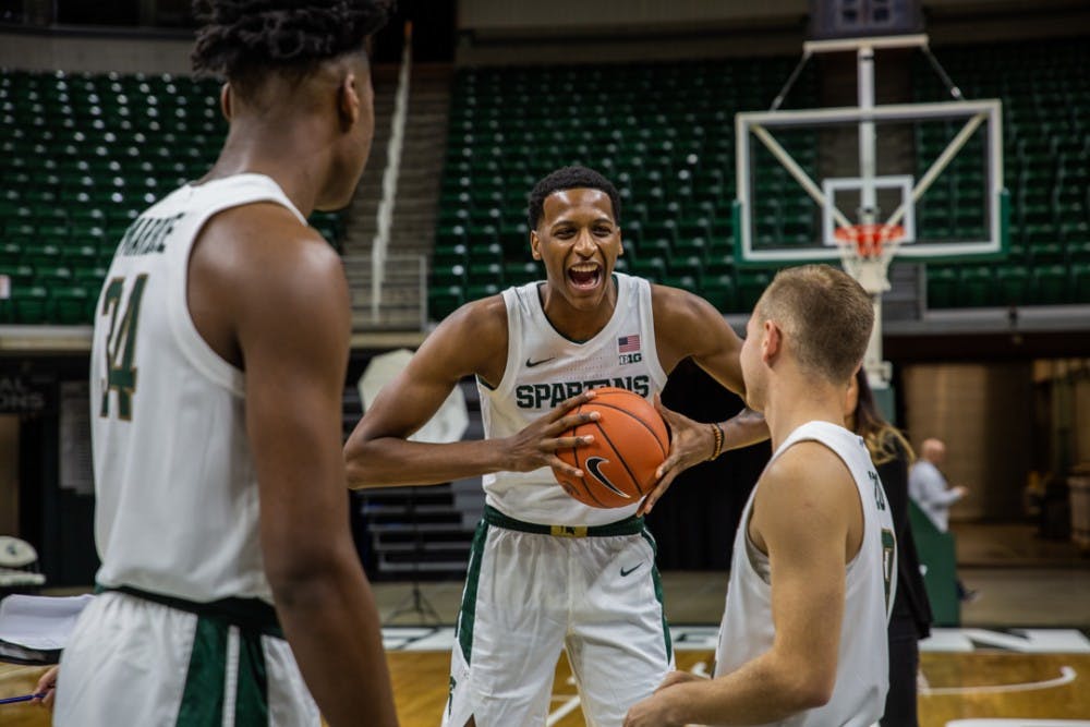 Sophomore forward Marcus Bingham Jr. laughs during MSU basketball media day on Oct. 15, 2019 at the Breslin Center.