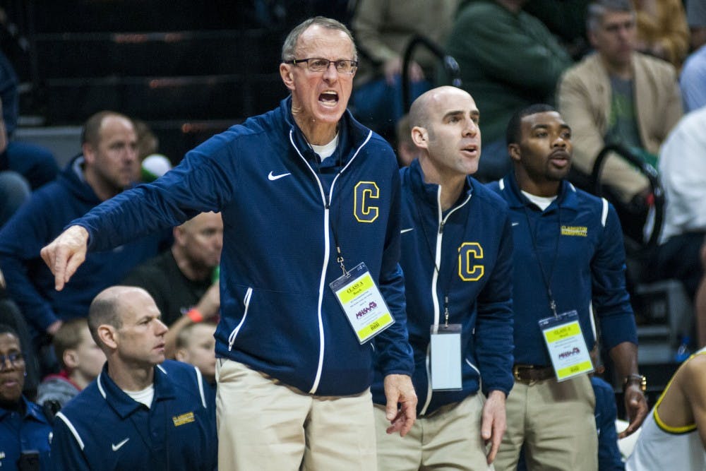 Clarkston head coach Dan Fife expresses emotion during the Class A boys basketball state final game on March 24, 2017 at Breslin Center. Clarkston defeated Grand Rapids Christian, 75-69.