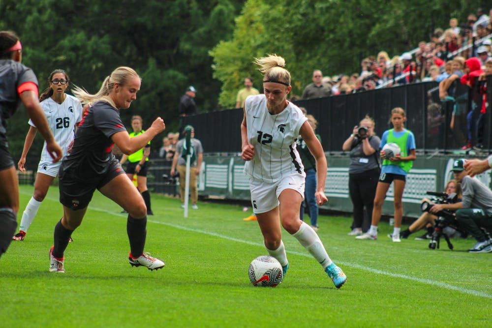 <p>Junior forward Jordyn Wickes (12)	during a game against Ohio State University at DeMartin Soccer Complex on Sept. 17, 2023.</p>