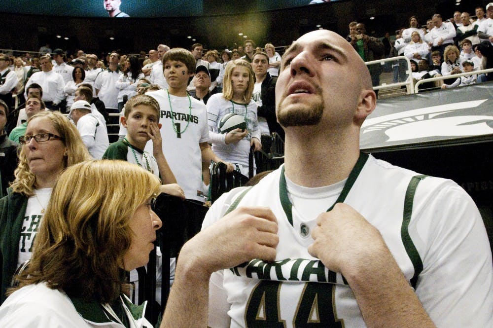 Senior center Anthony Ianni looks up to the big screen with tears in his eyes on March 24, 2012 at Breslin Center. The preceding 72-70 loss to Ohio State was the last game Ianni will play at Breslin Center. State News File Photo`