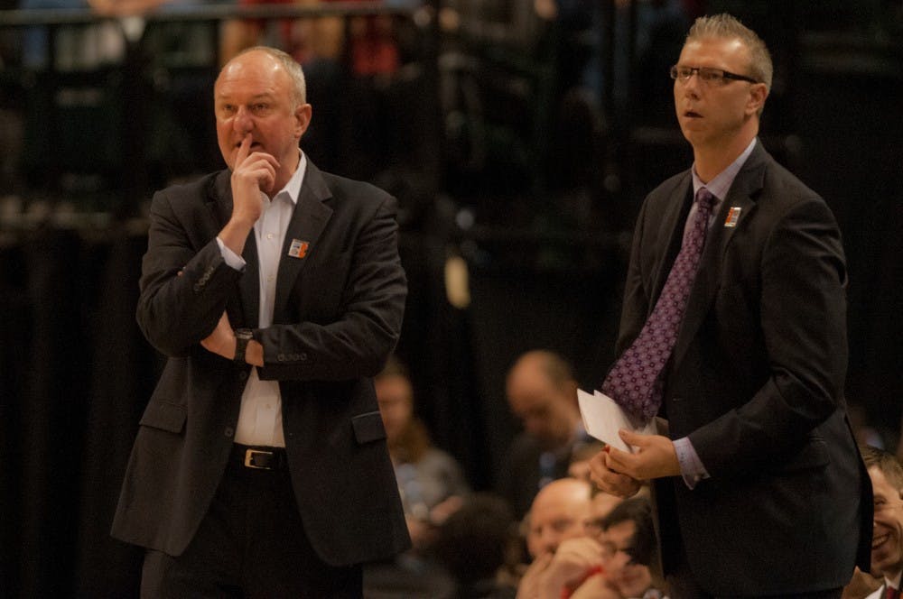 Head coach Thad Matta left, and assistant coach Jeff Boals right watch the first half of the game on March 10, 2016 at Bankers Life Fieldhouse in Indianapolis, Indiana. The Spartans play the Buckeyes Friday March 11, 2016 at 6:30 p.m. 