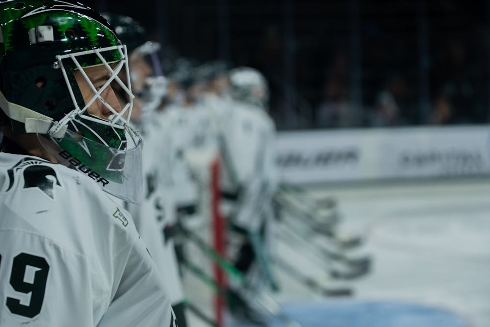 Freshman goalie Pierce Charleson stands in a line, prior to the start of the Spartans' 2-0 victory against the Buckeyes on Jan. 24, 2021.