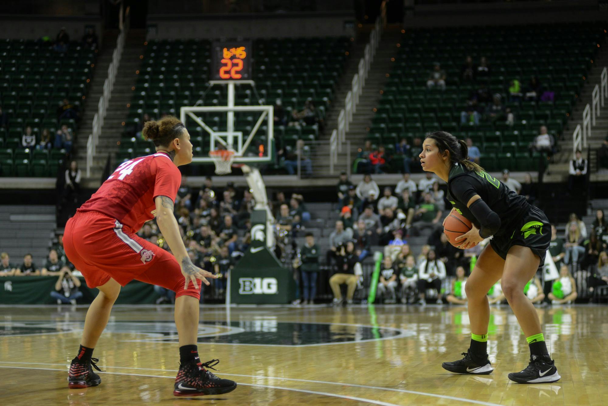 <p>Ohio State freshman guard Kierstan Bell and Michigan State freshman guard Moira Joiner during the game against Ohio State on Jan. 16.</p>