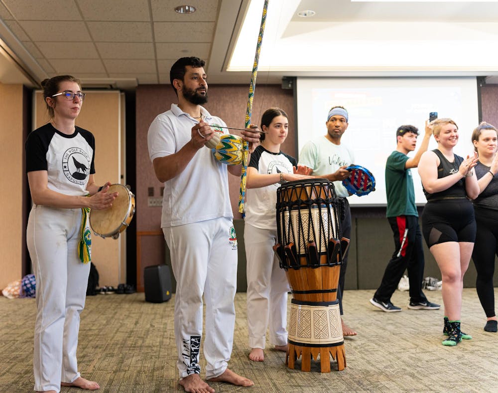 <p>Capoeira is one of the only martial arts that require music—team members of the local capoeira breaking down the instruments that make capoeira music at MSU on April 20,2023.</p>