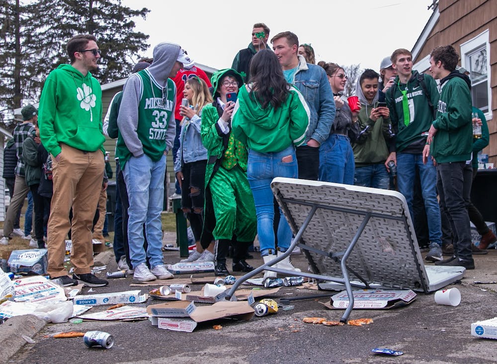 Students party at housing near MSU on the Saturday before St. Patrick's Day despite health warnings related to COVID-19.