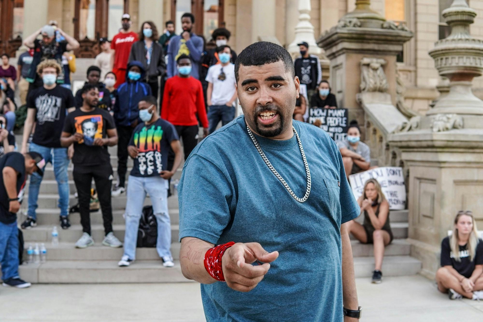 <p> Organizer Paul Birdsong giving a speech, at a protest around downtown Lansing on June 3, 2020.</p>