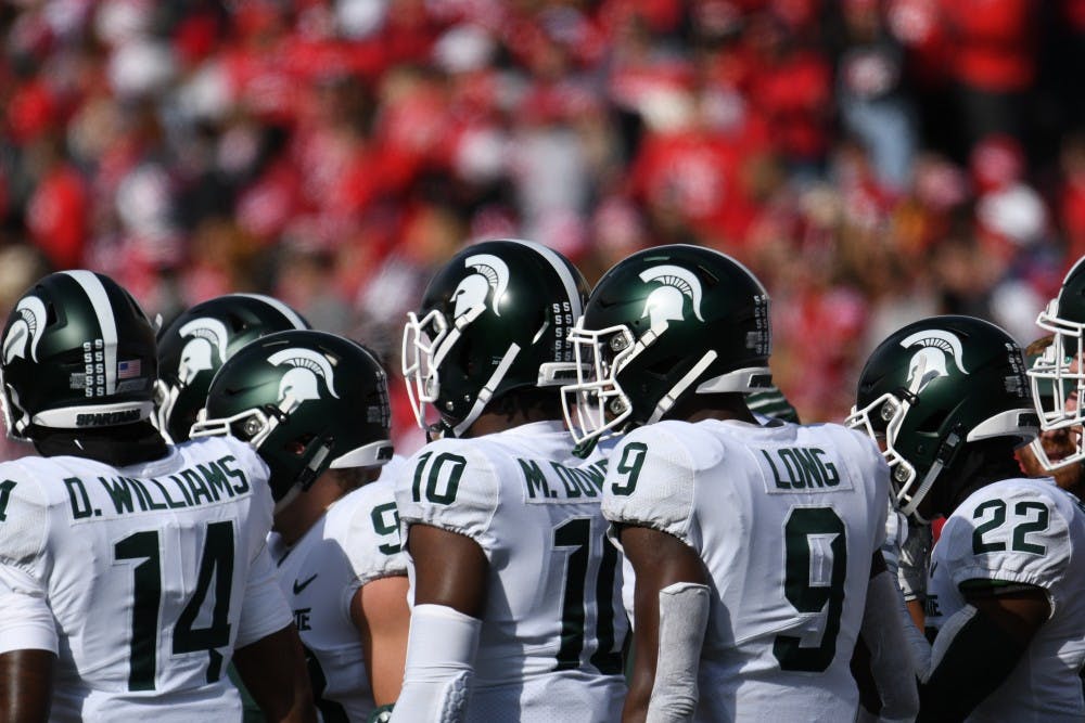 MSU football players during the game against Wisconsin at Camp Randall Stadium on October 12, 2019. The Spartans lost to the Badgers 38-0. 