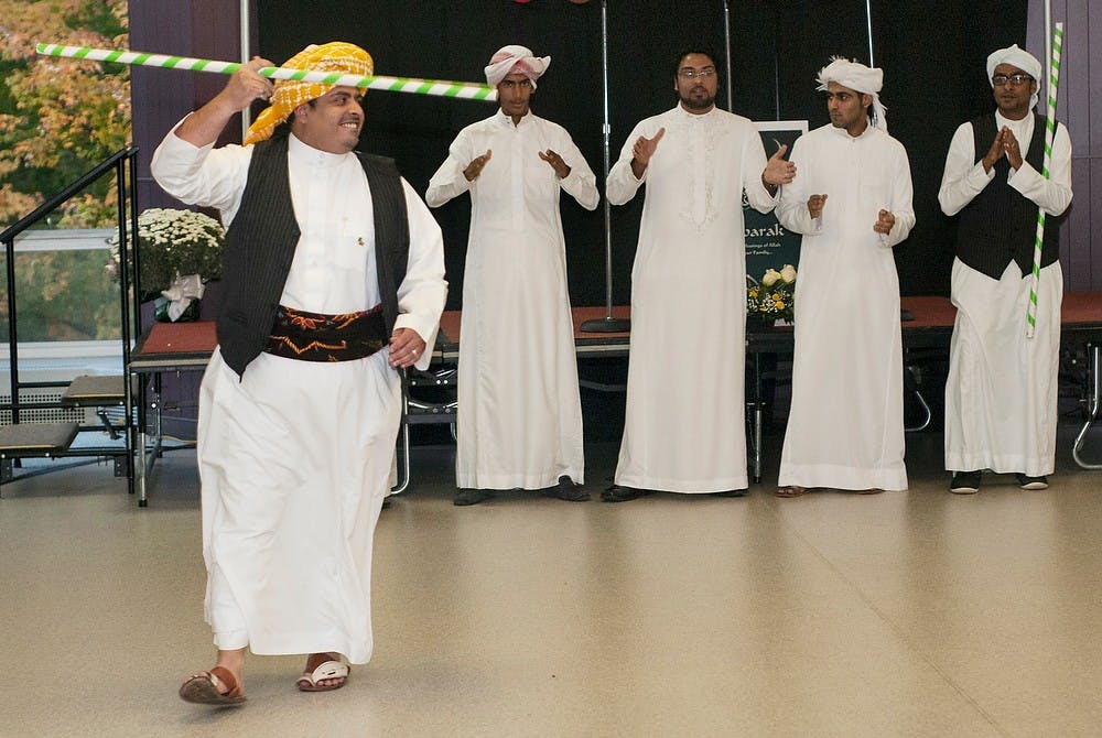 	<p>Graduate student Abdullah Fatta performs a dance with the Saudi Student Organization Oct. 24, 2013, at McDonel Hall. Multiple <span class="caps">MSU</span> student organizations worked together to put on an event to celebrate Eid Al-Adha, the second Islamic Holiday of the year. Margaux Forster/The State News</p>