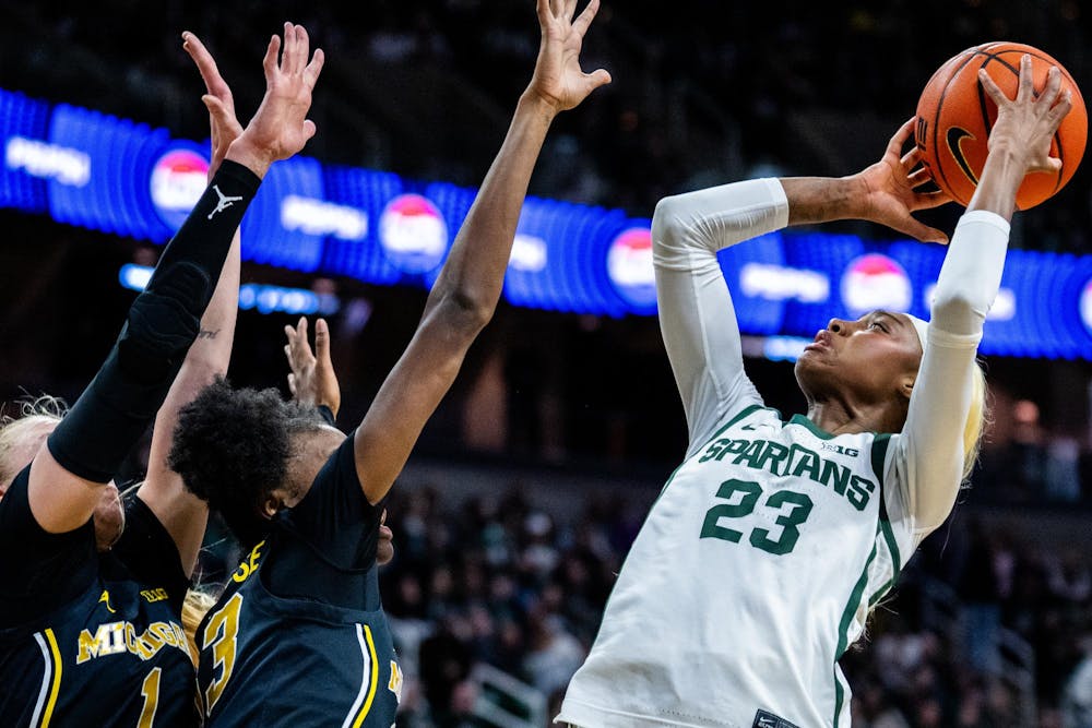 Michigan State Spartans guard Jalyn Brown (23) attempts a basket during the women’s rivalry matchup at the Breslin Student Events Center in East Lansing, Mich., on Sunday, Feb. 1, 2026.
