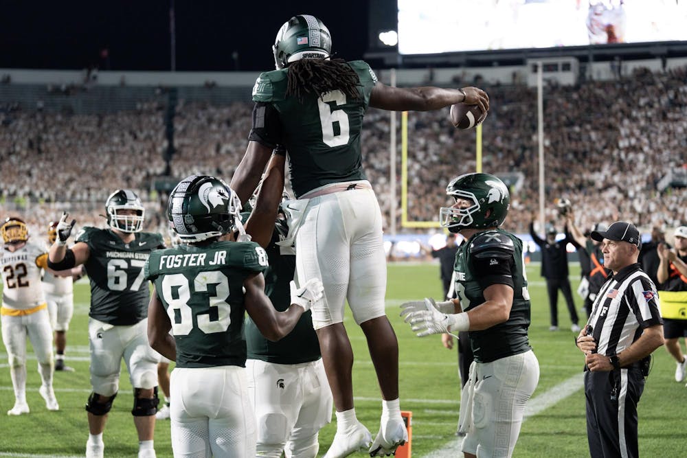 <p>Maliq Carr lifted in the air after scoring against Central Michigan during Michigan State's home opener. Carr's Spartans won 31-7 on September 1st, 2023.</p>