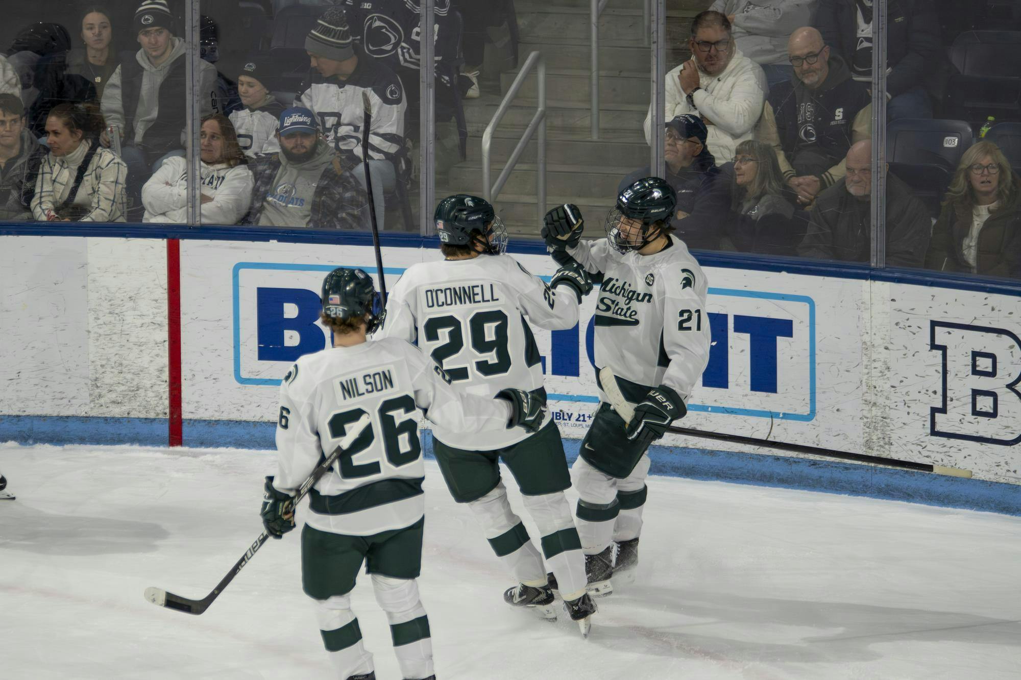 <p>Michigan State freshman forward Anthony Romani (21) and junior forward Gavin O’Connell (29) celebrate after an empty net goal during a game between Michigan State and Penn State at Pegula Ice Arena in University Park, Pennsylvania, on Friday, Jan. 30, 2026.</p>