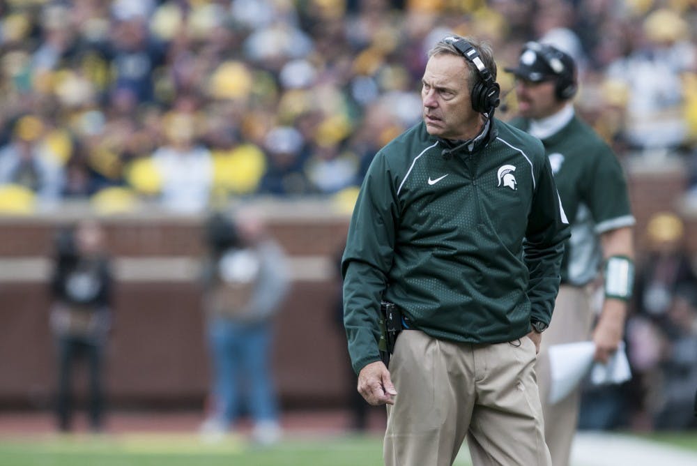 <p>Head coach Mark Dantonio looks onto the field on Oct. 17, 2015 during the second quarter of the game against Michigan at Michigan Stadium in Ann Arbor. The Spartans defeated the Wolverines, 27-23. </p>