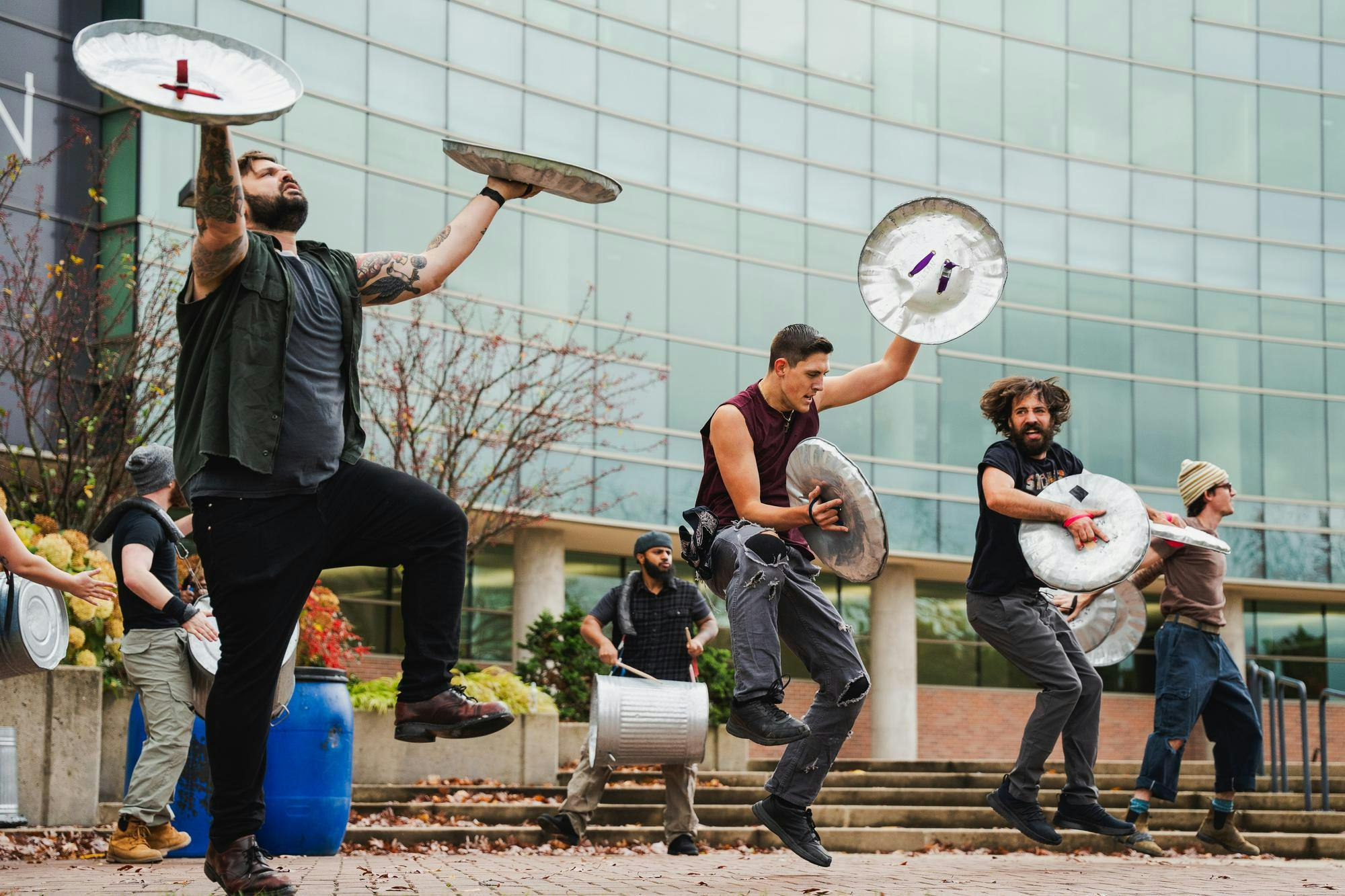 STOMP members perform a number from their performance in front of Wharton Center for Performing Arts on Nov. 6, 2024.