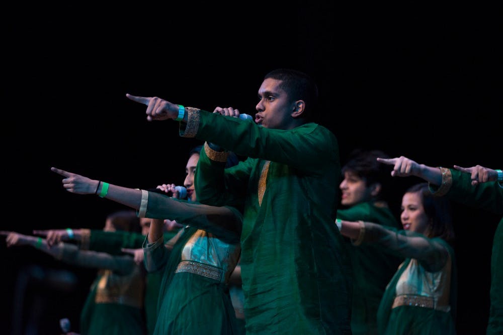 Neuroscience senior Alwin Davidon performs with the Spartan Sur during Saathiya on April 9, 2016 at the Wharton Center. Saathiya is an event put on by the Coalition of Indian Undergraduate Students at MSU. 