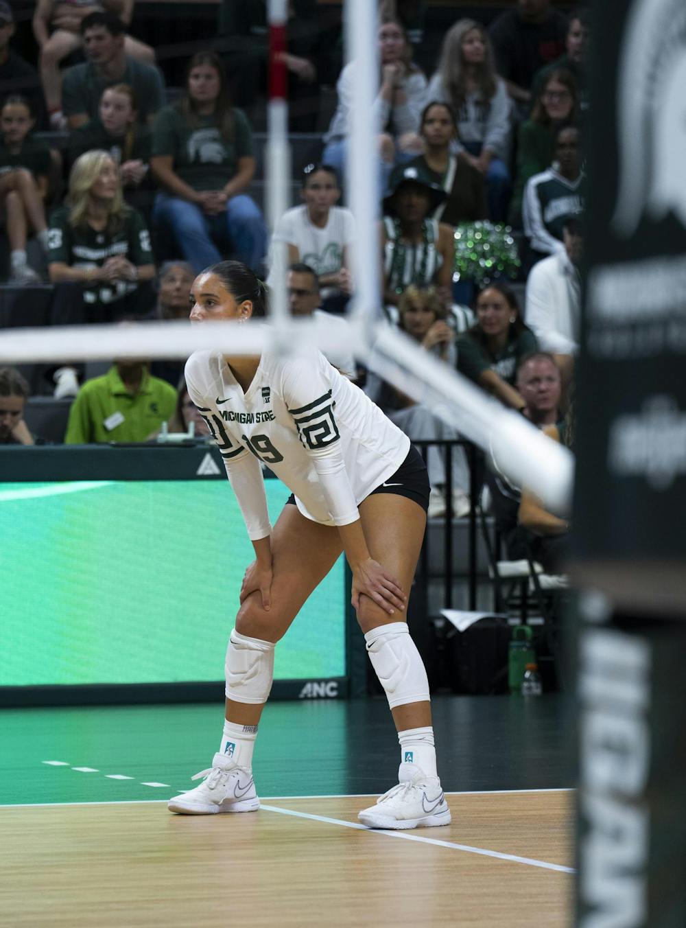 MSU Junior Hayley Ogden #19 sits at the next at the Breslin Center during the MSU v Pennstate Volleyball game In East Lansing, MI on Sunday Sep. 27th, 2026