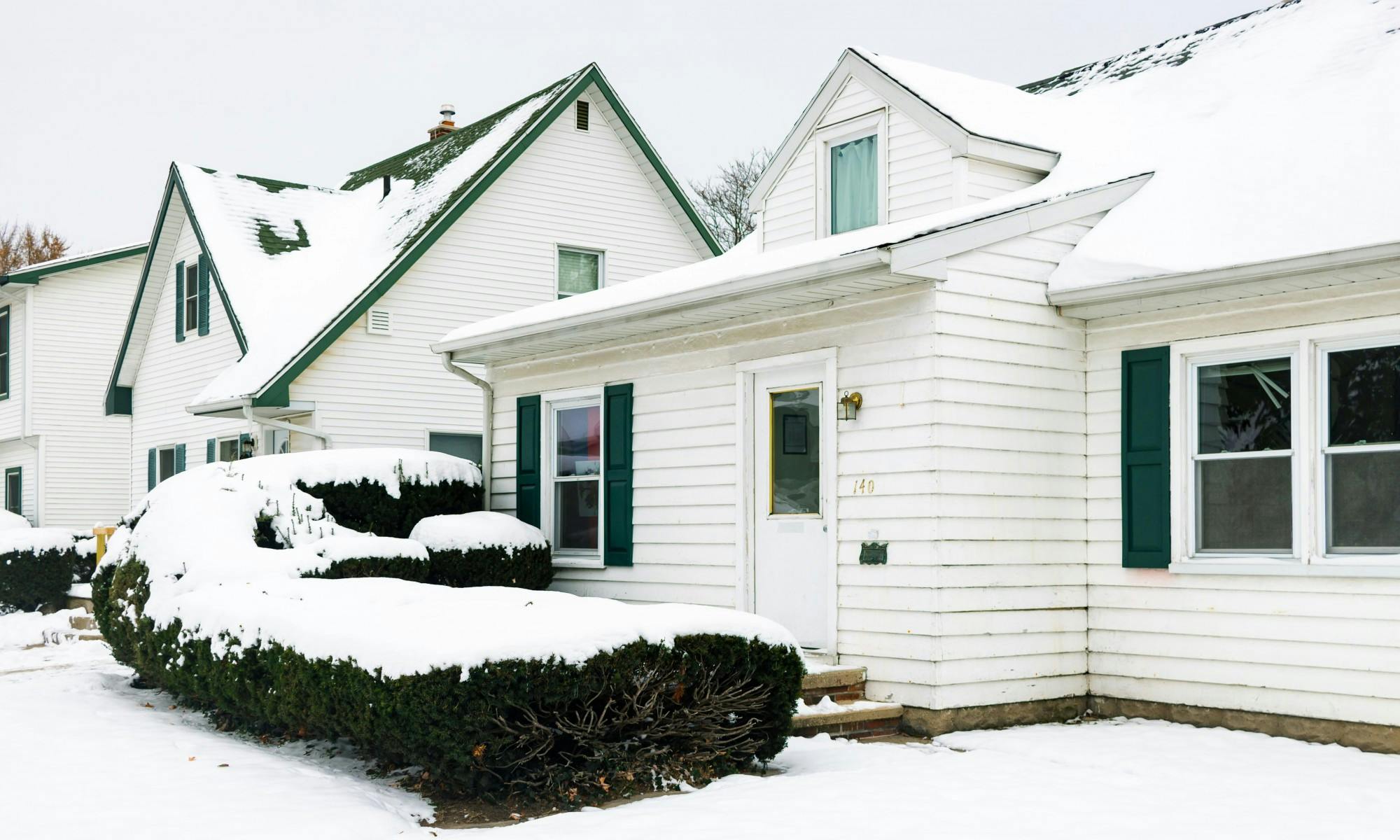 <p>A snowy driveway in East Lansing.</p>