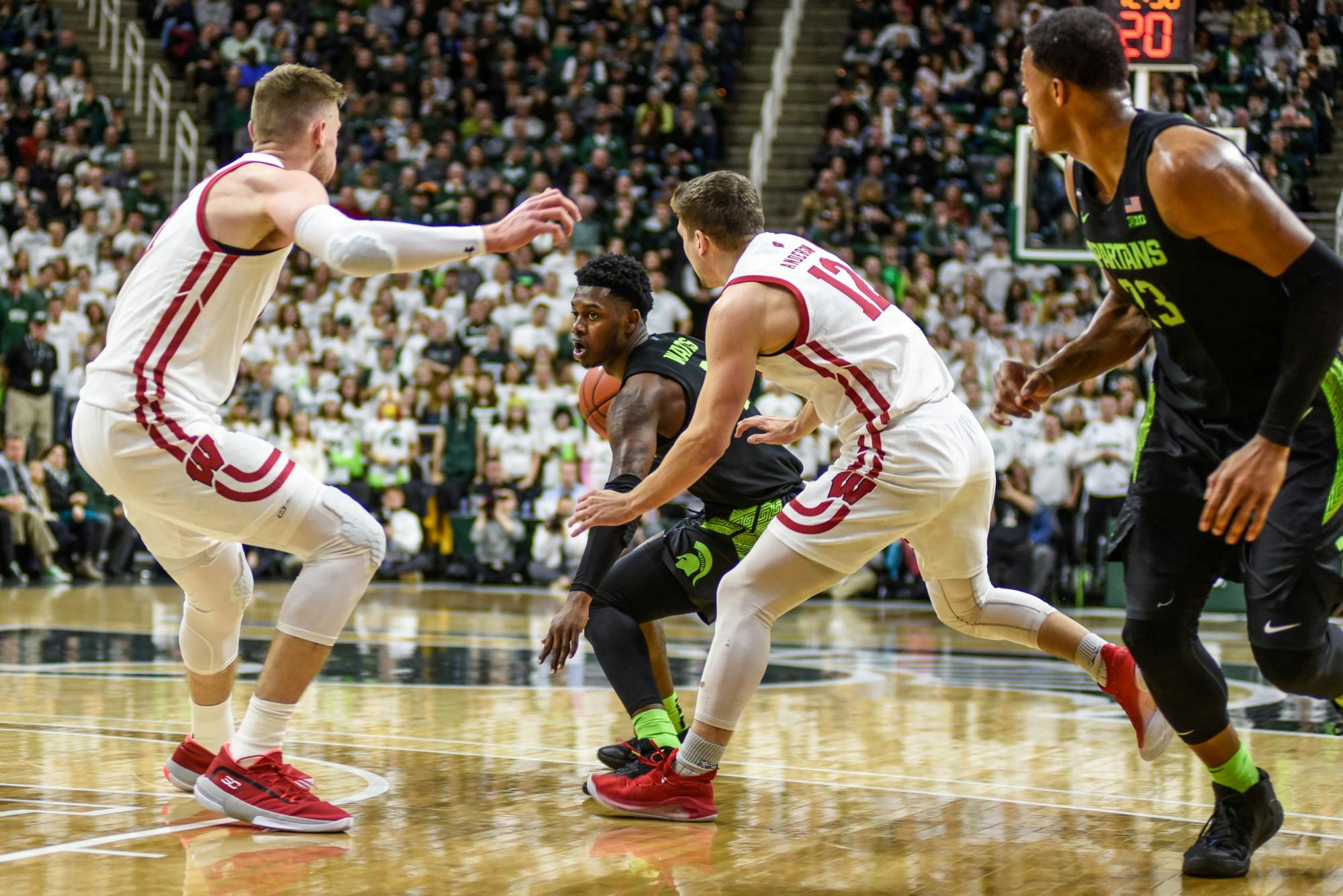 Freshman guard Rocket Watts (2) moves with the ball during the game against Wisconsin at Breslin Center on Jan. 17, 2020.The Spartans defeated the Badgers, 55-67.