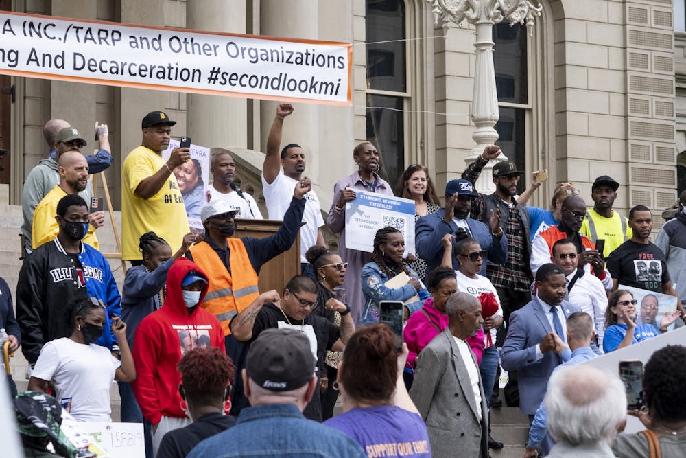 <p>Those who were previously incarcerated were called up to the stairs at the Criminal Justice Reform Rally at Michigan&#x27;s Capitol on Oct. 14, 2021.</p>