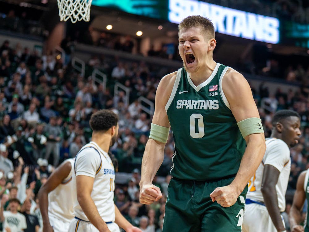 <p>Michigan State's forward and senior Jaxon Kohler (0) scores a basket and celebrates versus San Jose State at the Breslin Center in East Lansing, Michigan on Thursday, Nov. 13, 2025.</p>