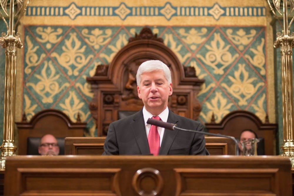 Michigan Gov. Rick Snyder addresses the audience on Jan. 19, 2016 during the State of the State Address at the Capitol in Lansing, Michigan.