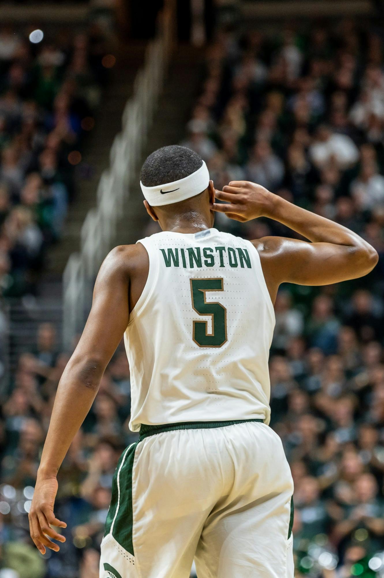 <p>Senior guard Cassius Winston gestures to a roaring crowd after hitting a three-pointer. The Spartans defeated the Hawkeyes, 78-70, on Feb. 25, 2020, at the Breslin Student Events Center. </p>