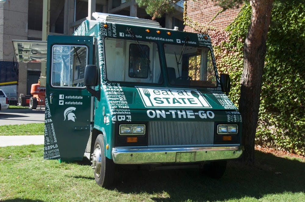 The Eat at State Food Truck stands ready to serve outside Spartan Stadium on Saturday, Sept. 15. The food truck made it's debut before the MSU vs. Notre Dame game. Griffin Zotter/The State News