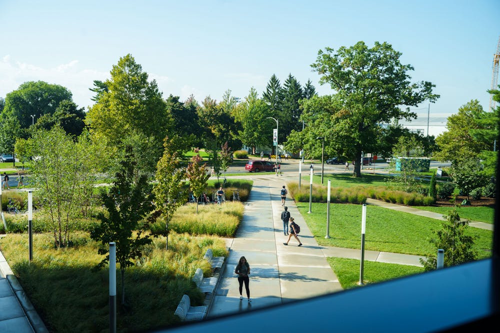 Students walk to and from classes in the Michigan State University STEM Teaching and Learning Facility on Sept. 21, 2022.