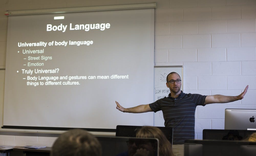 Professor Ryan Claytor gestures a type of body language during a comics class on Feb. 13, 2017 at Urban Planning and Landscape building.