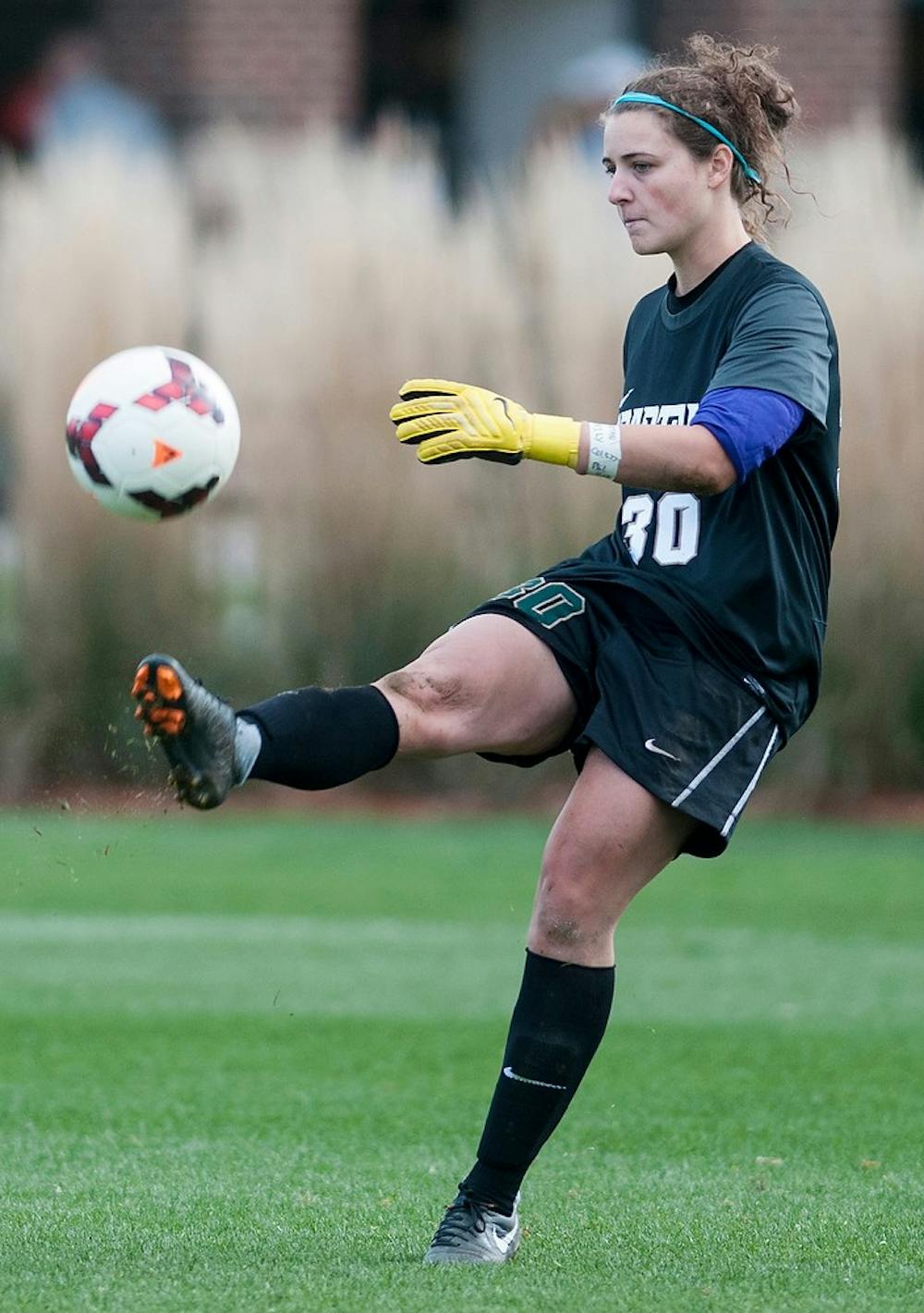 	<p>Sophomore goalkeeper Gabrielle Gauruder kicks the ball back onto the field Oct. 20, 2013 at DeMartin Stadium. <span class="caps">MSU</span> lost to Indiana 2-3. Margaux Forster/The State News</p>